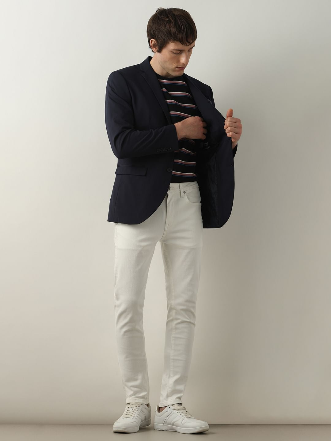 White Mid Rise Leon Slim Fit Jeans
