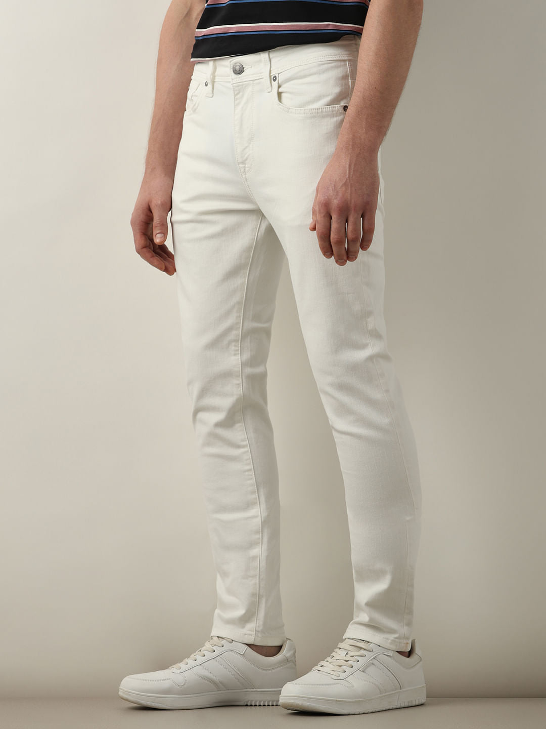 White Mid Rise Leon Slim Fit Jeans