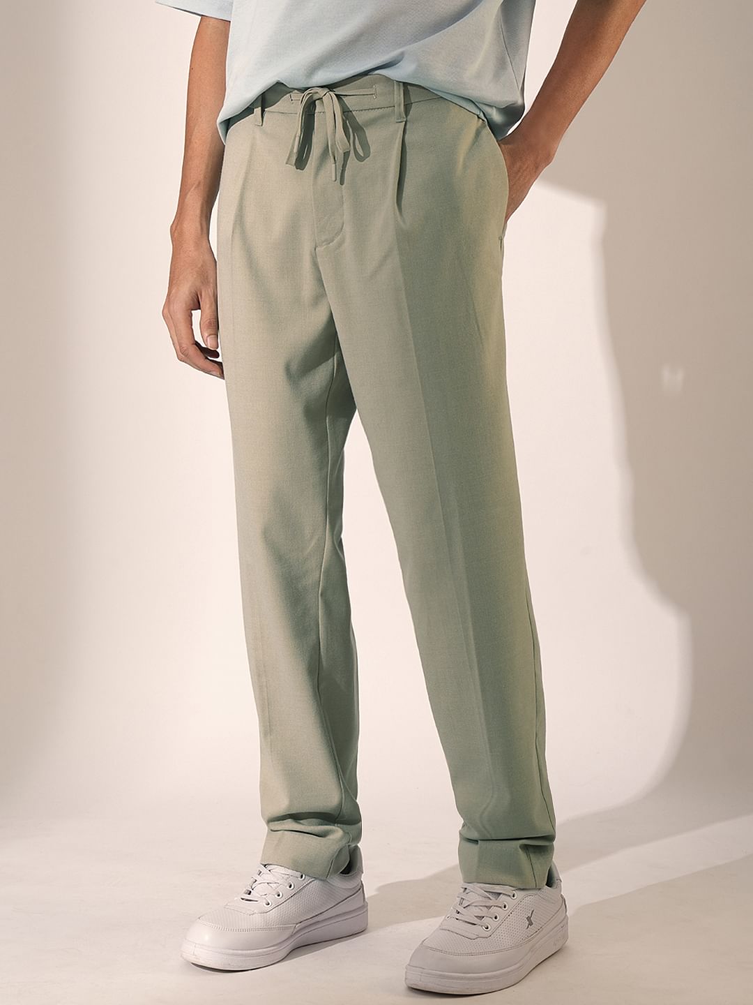 Beige Pleated Tapered Fit Trousers