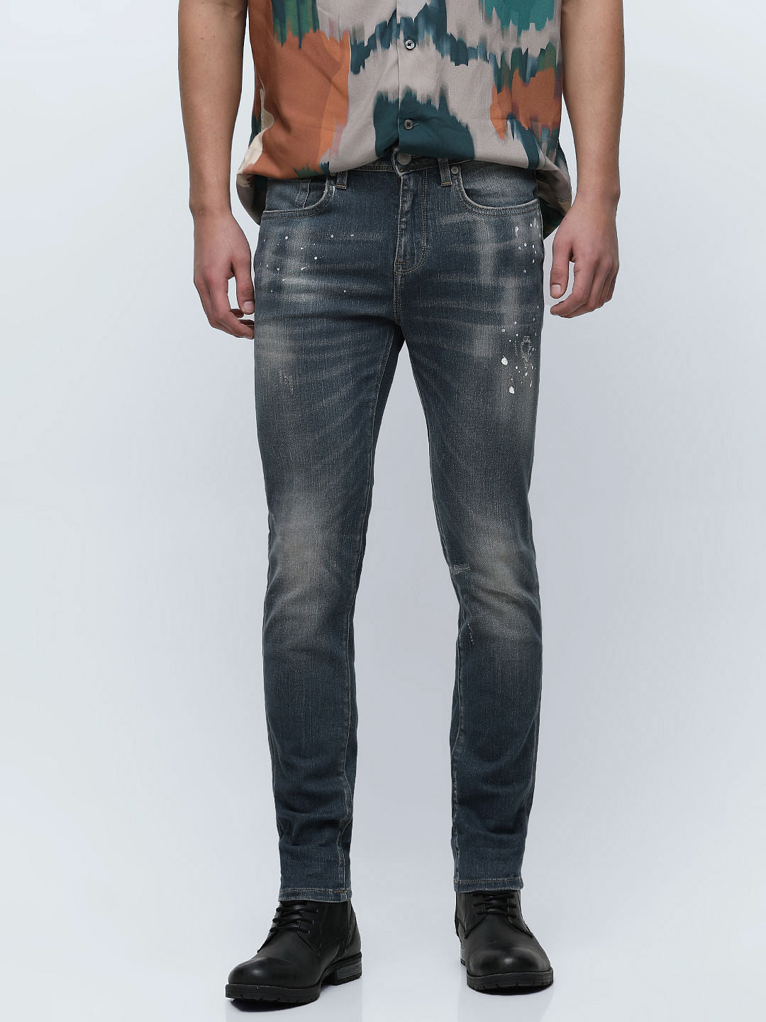 Blue Mid Rise Distressed Slim Fit Jeans