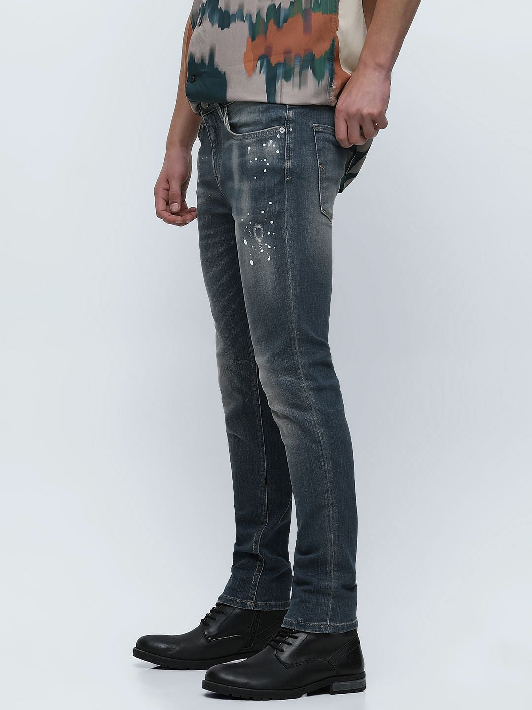 Blue Mid Rise Distressed Slim Fit Jeans