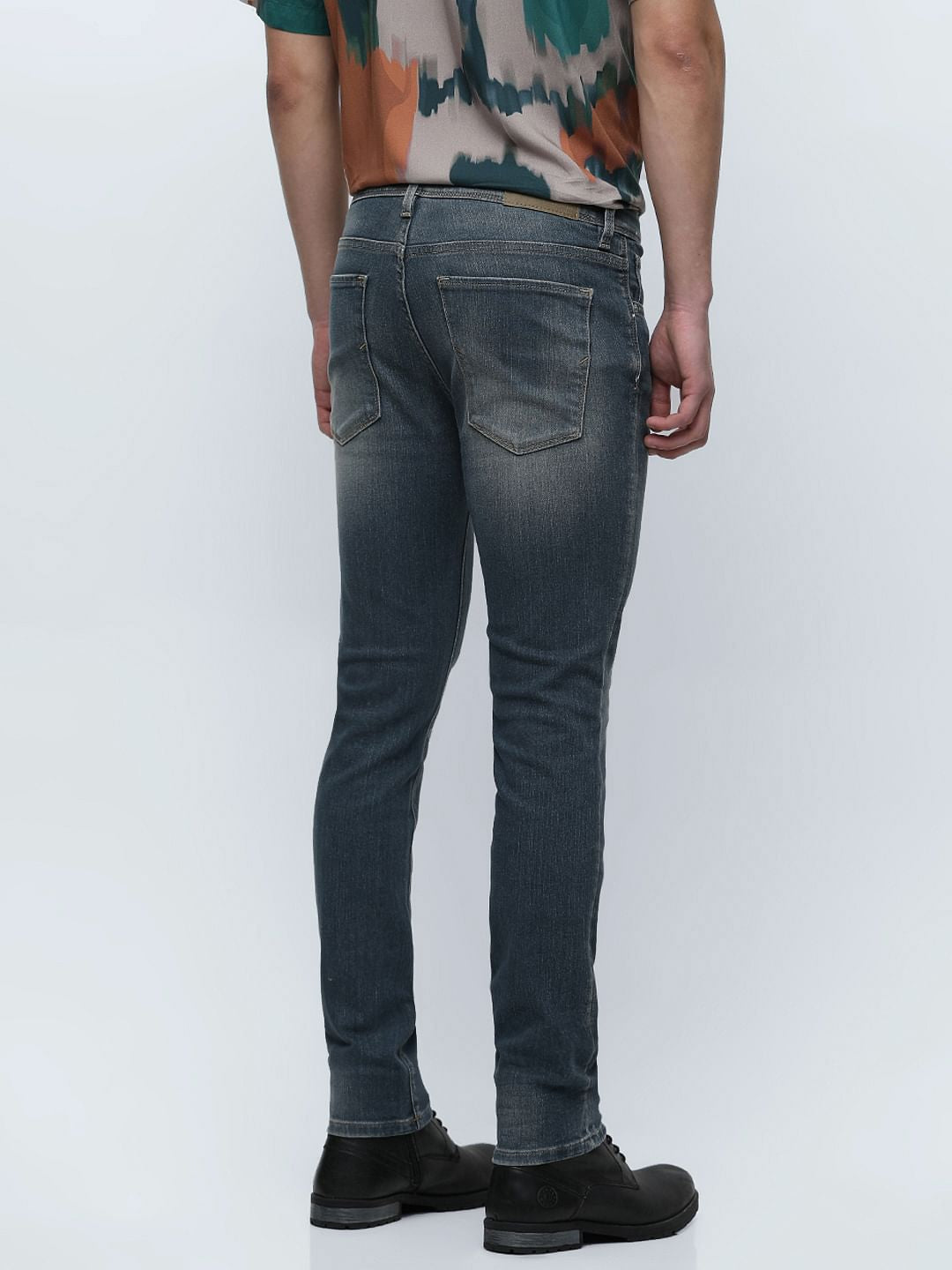 Blue Mid Rise Distressed Slim Fit Jeans