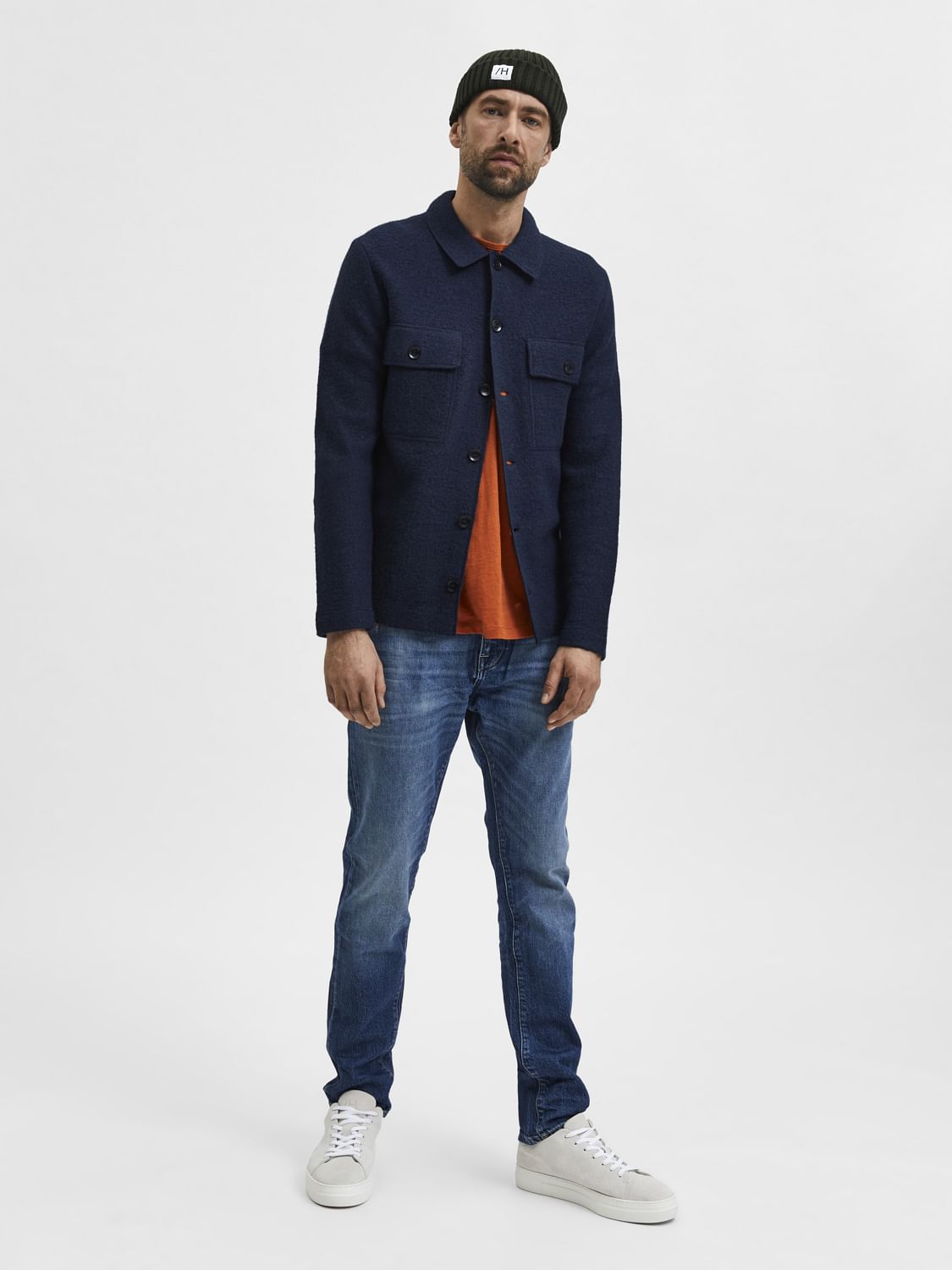 Blue Mid Rise Distressed Leon Slim Jeans