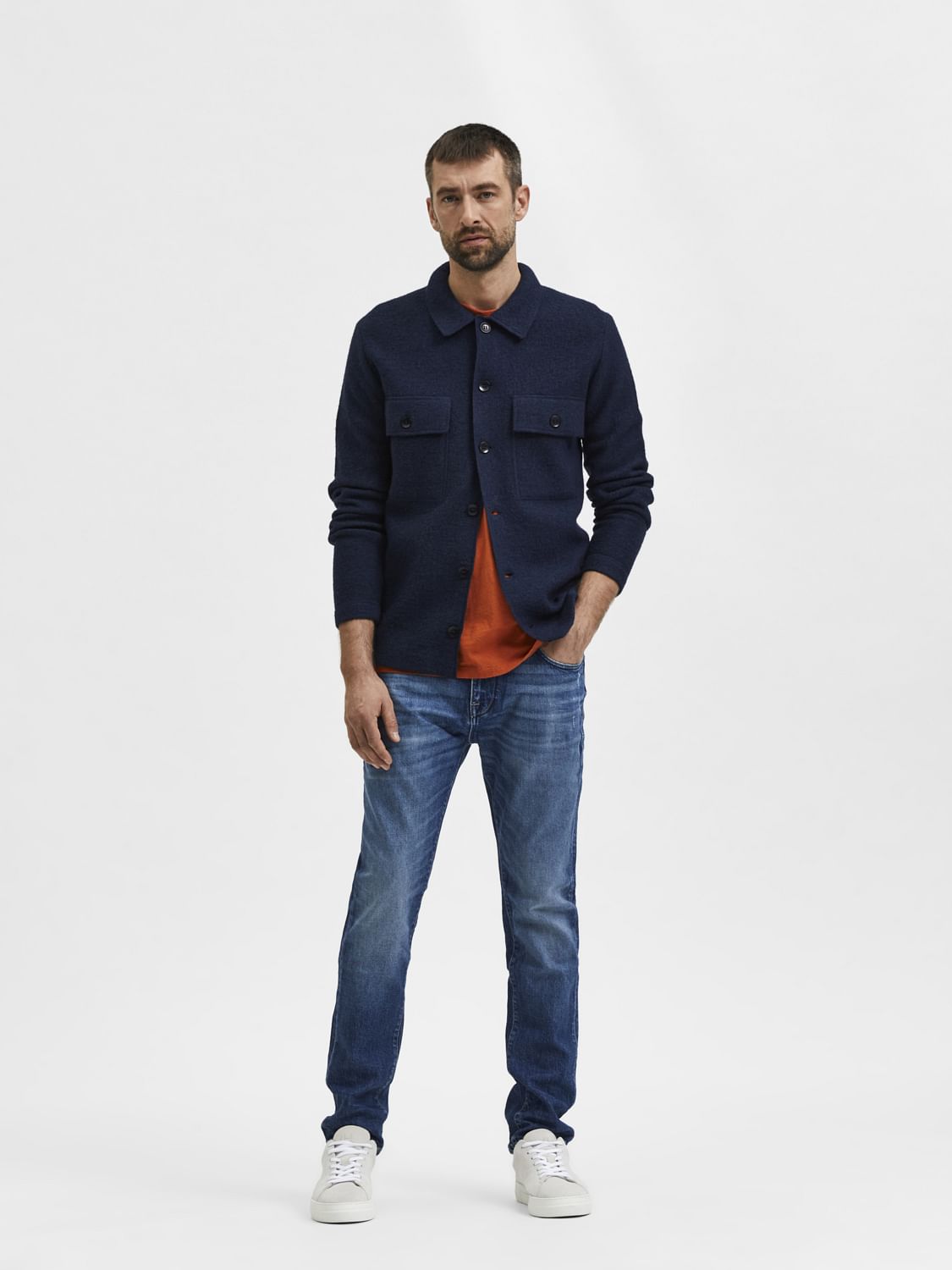 Blue Mid Rise Distressed Leon Slim Jeans