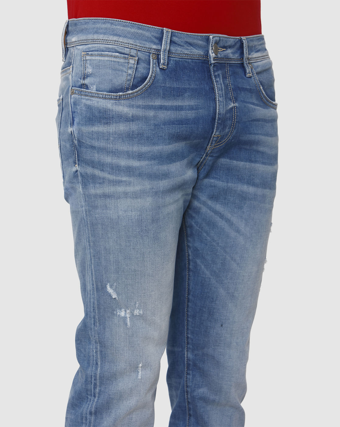 Light Blue Mid Rise Distressed Leon Slim Fit Jeans