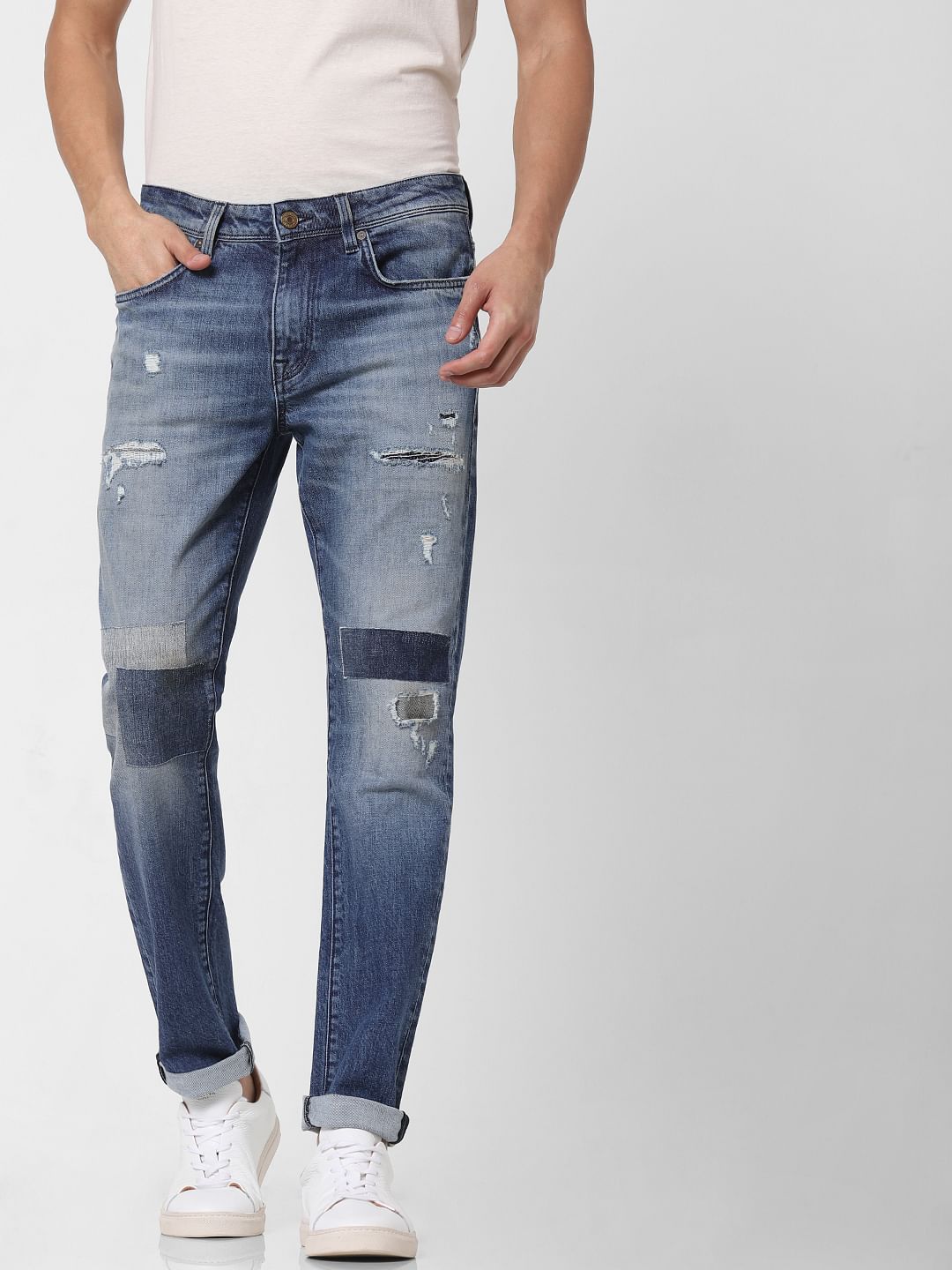 Blue Mid Rise Distressed Leon Slim Fit Jeans