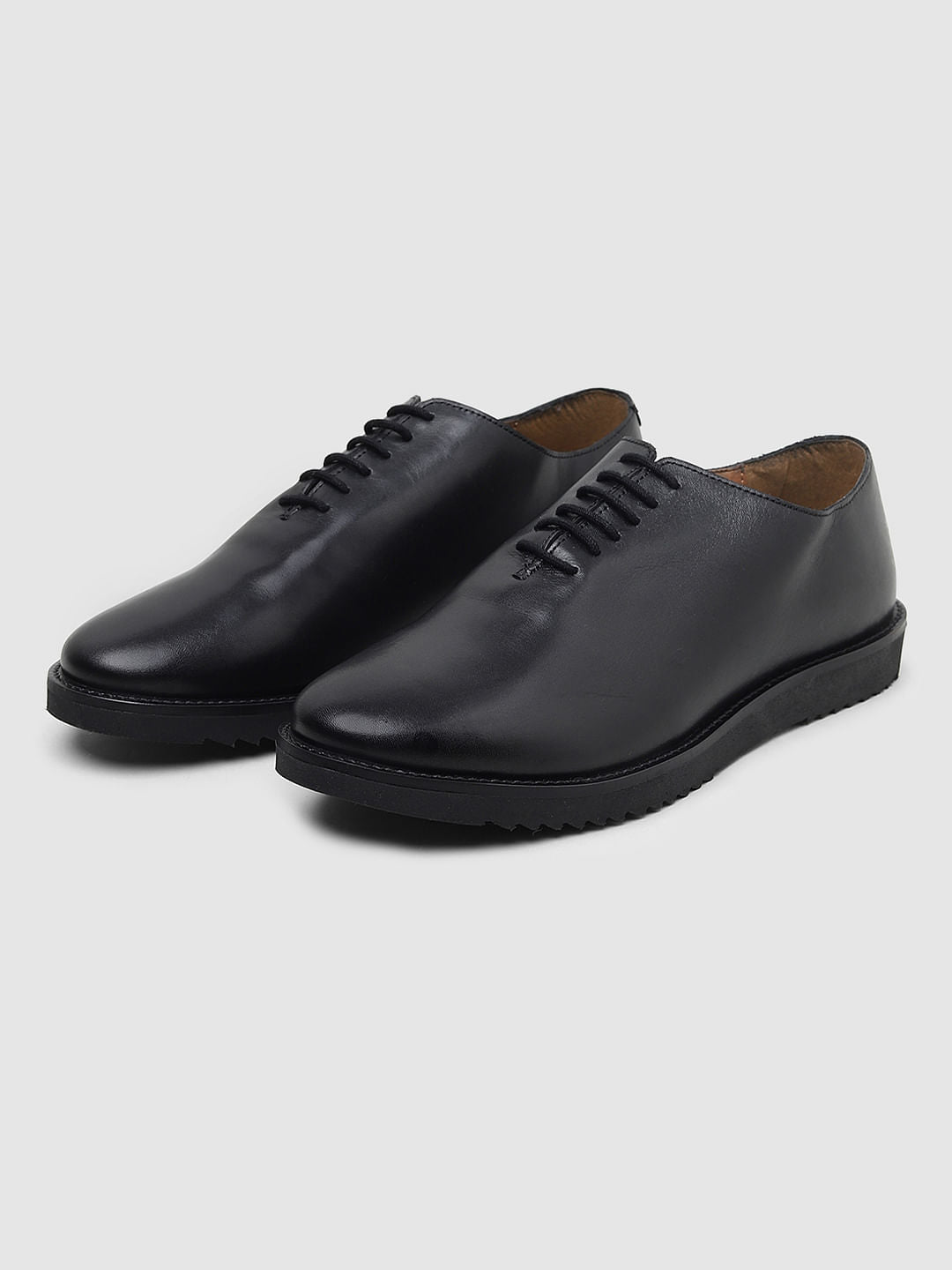 Black Whole Cut Leather Shoes