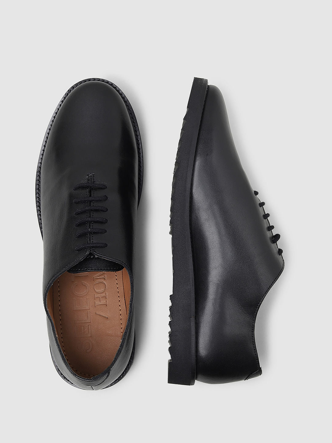 Black Whole Cut Leather Shoes