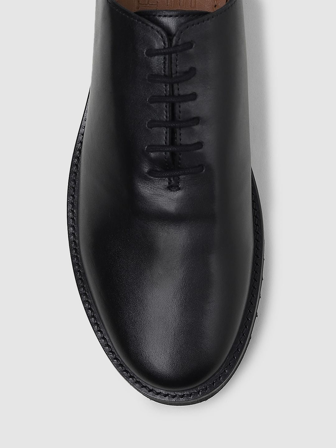 Black Whole Cut Leather Shoes